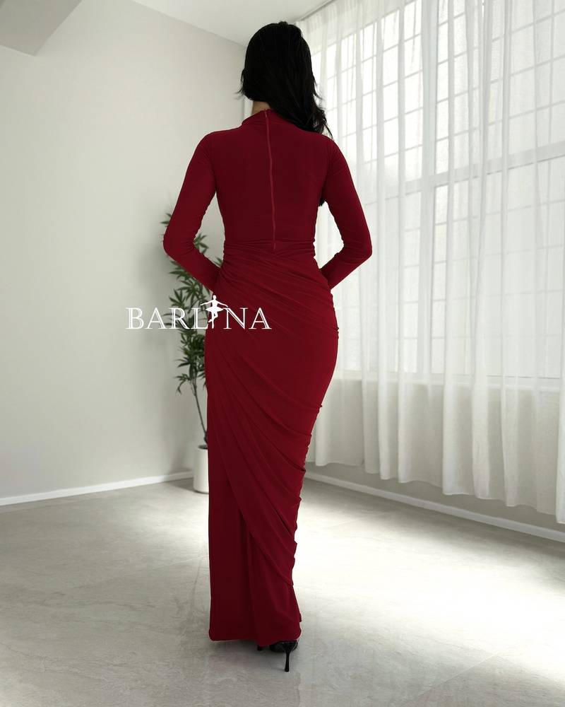 Red dress with long sleeves and side pleats