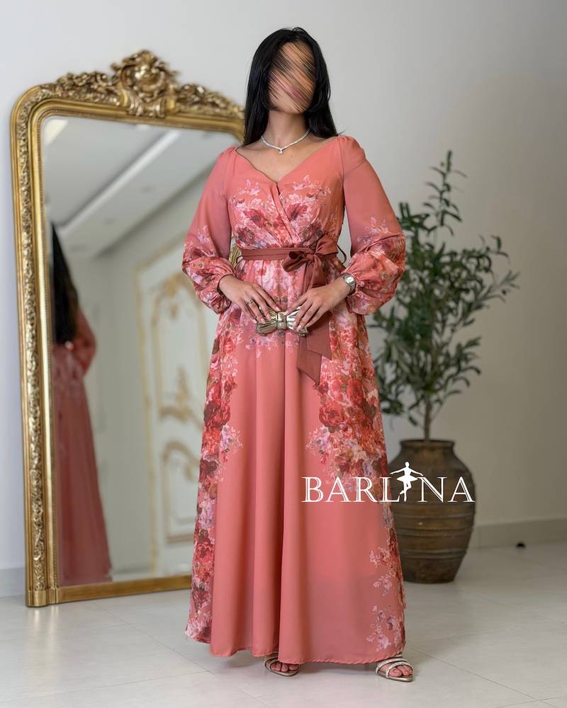 Pink floral dress with a V-neck and belt