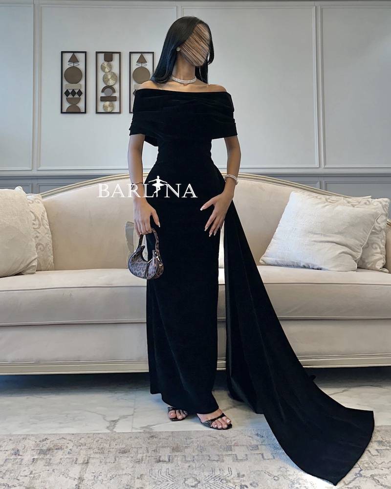 Black evening dress with side velvet tail