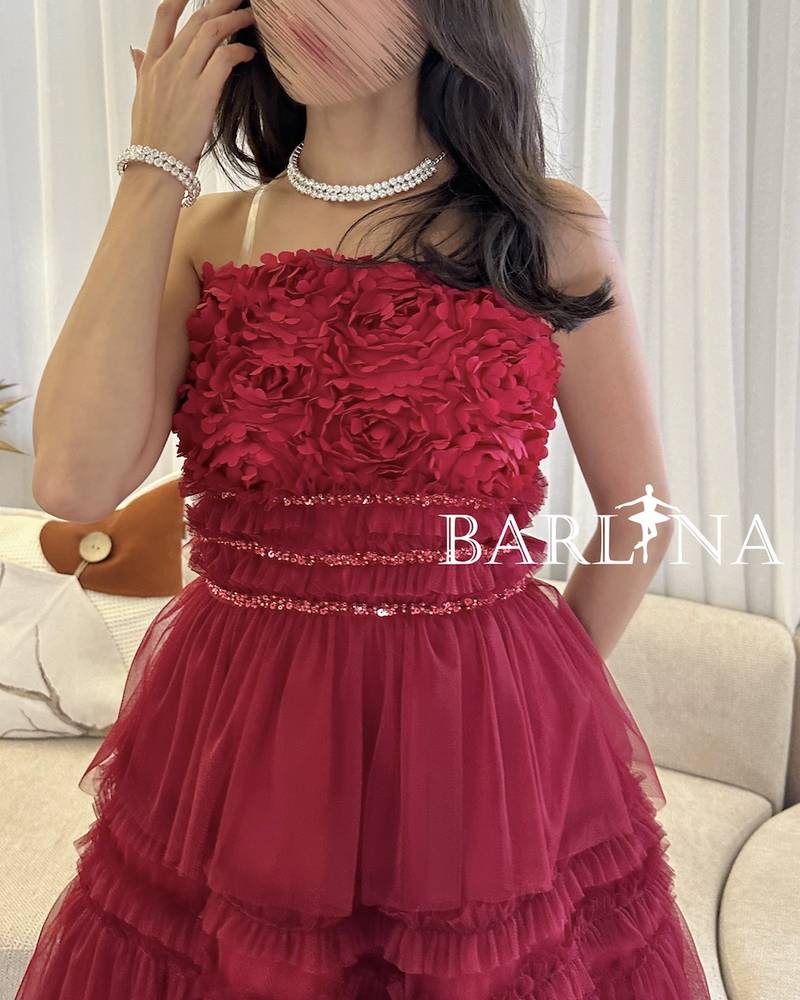 Red tulle dress with prominent roses