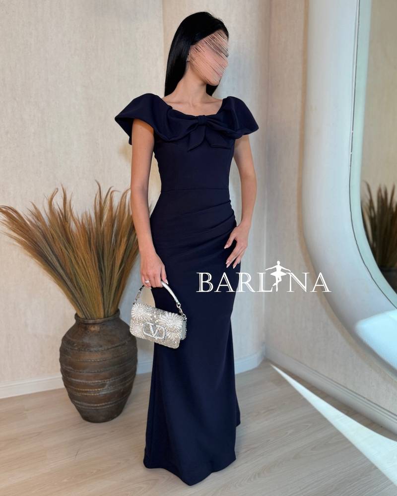 Dark navy dress with a bow on the chest