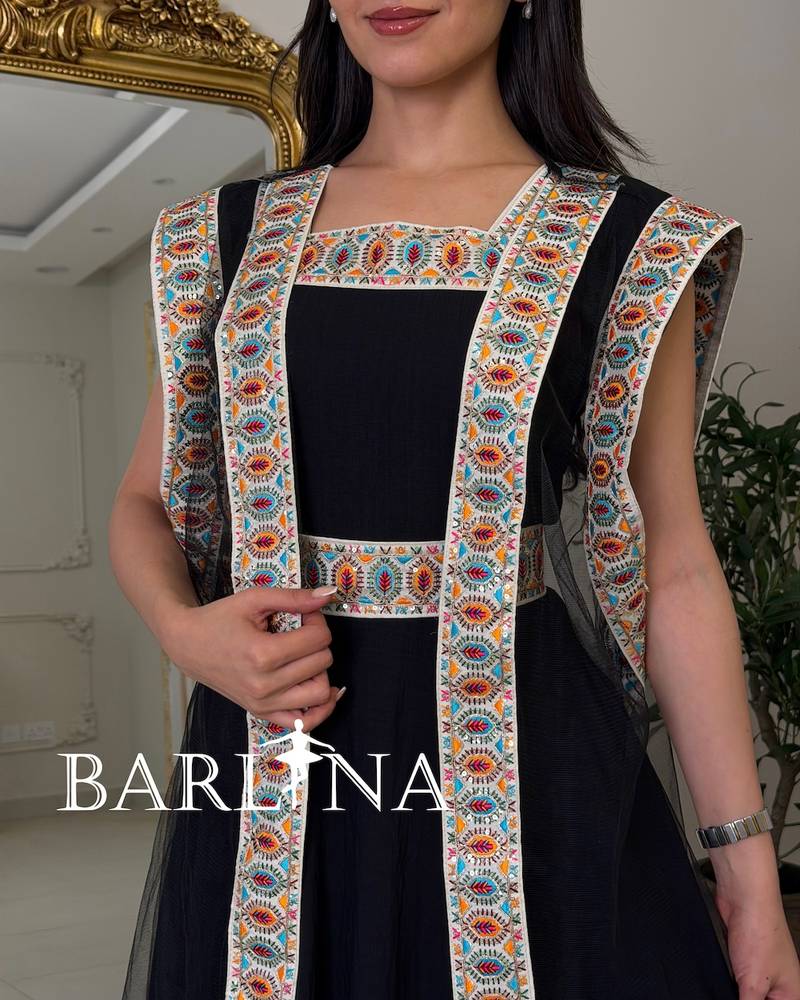 Black jalabiya with colorful traditional embroidery