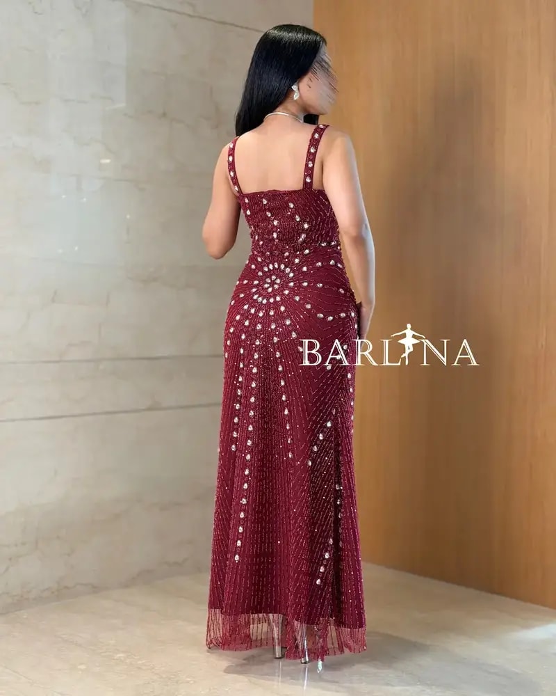 Burgundy skinny evening dress with shimmering embroidery