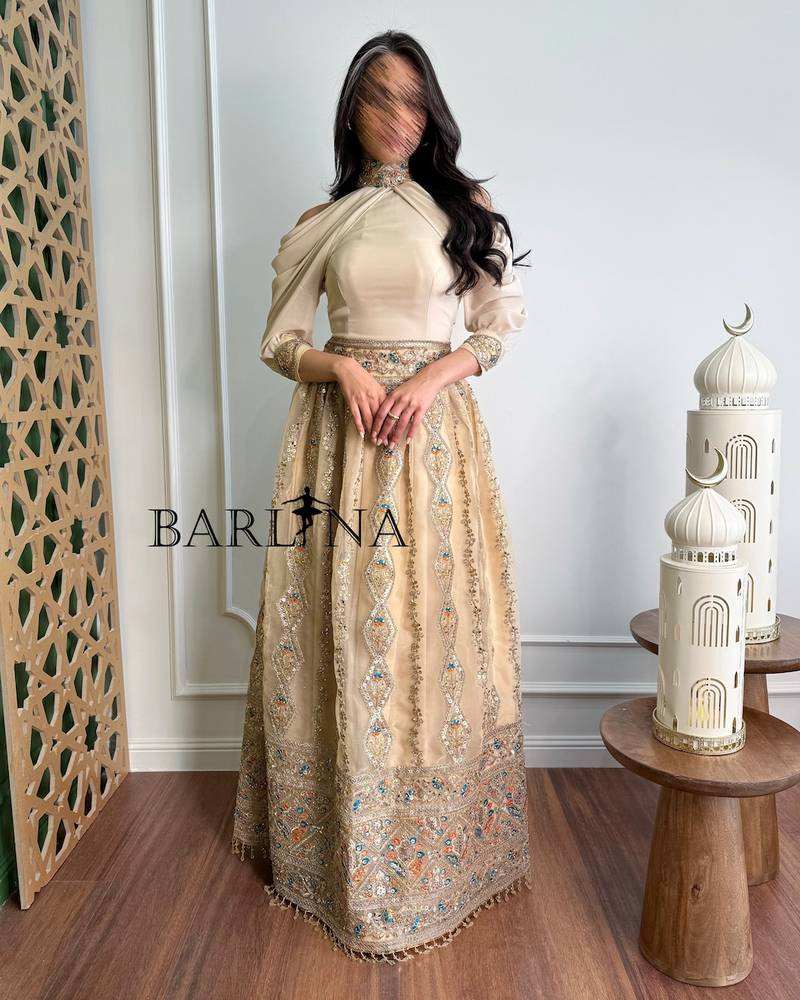 Luxurious beige jalabiya with long flowing sleeves