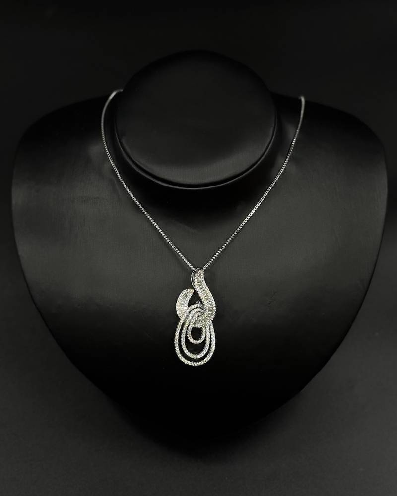 Chain and earrings with a modern, interlocking design