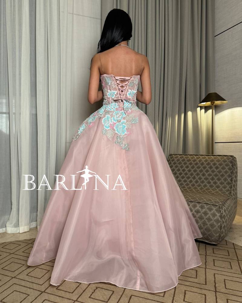 Pink dress with colorful embroidered flowers