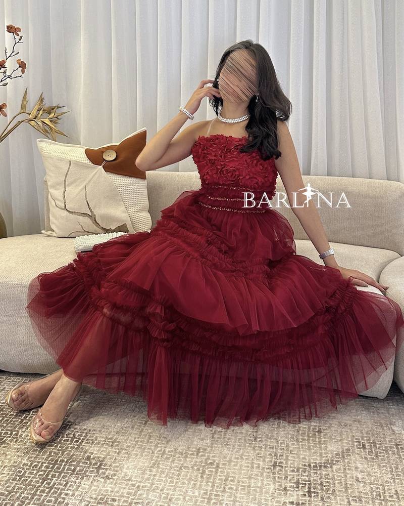 Red tulle dress with prominent roses