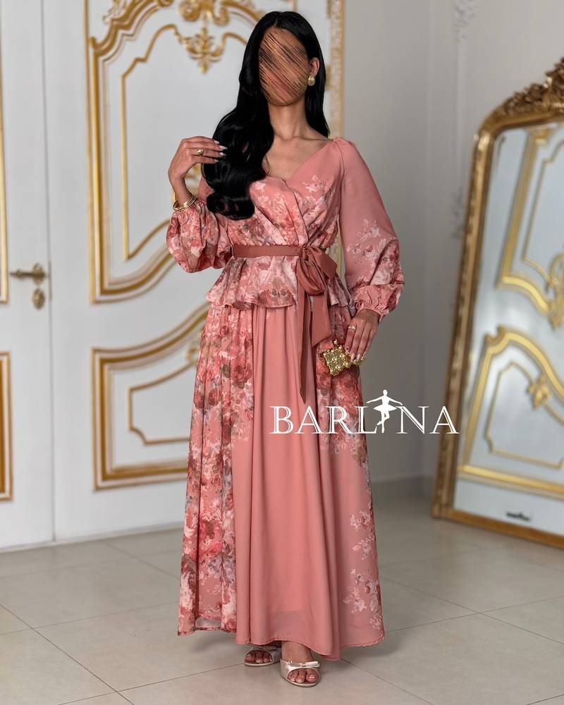 Floral pink set with a ruffled waist and flowing skirt