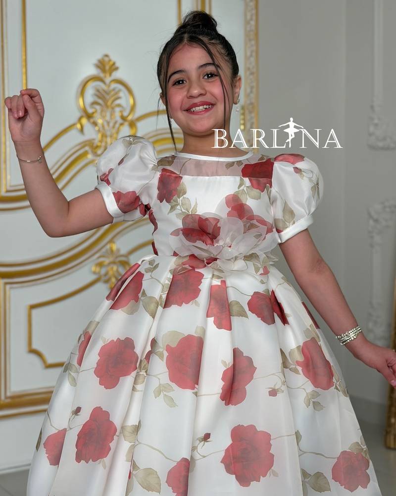 White girl's dress with red floral prints