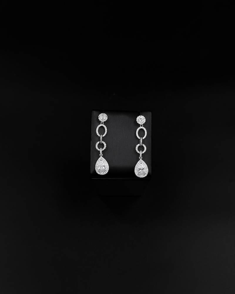 Long silver evening earrings