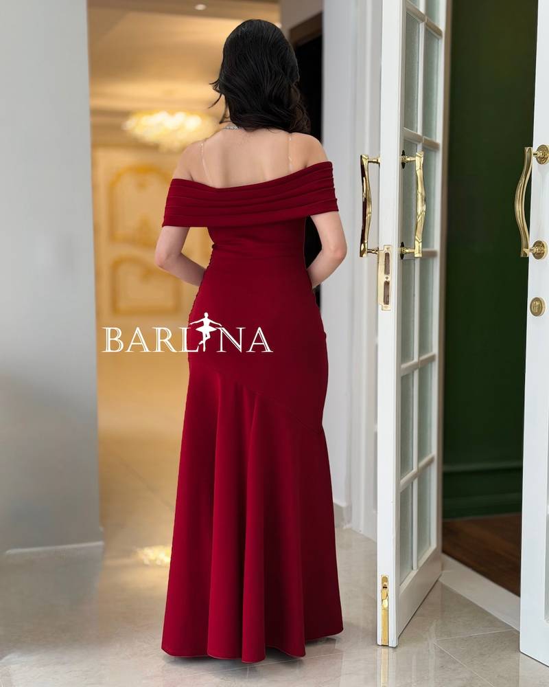 Red draped dress with dropped shoulders