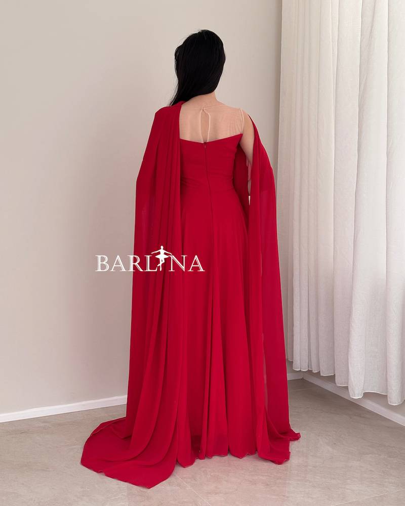 Long red dress with a soft design and a shawl