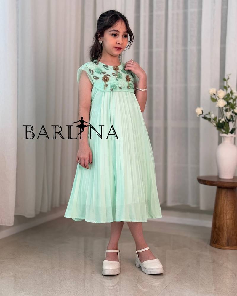 A soft girl's dress with floral embroidery