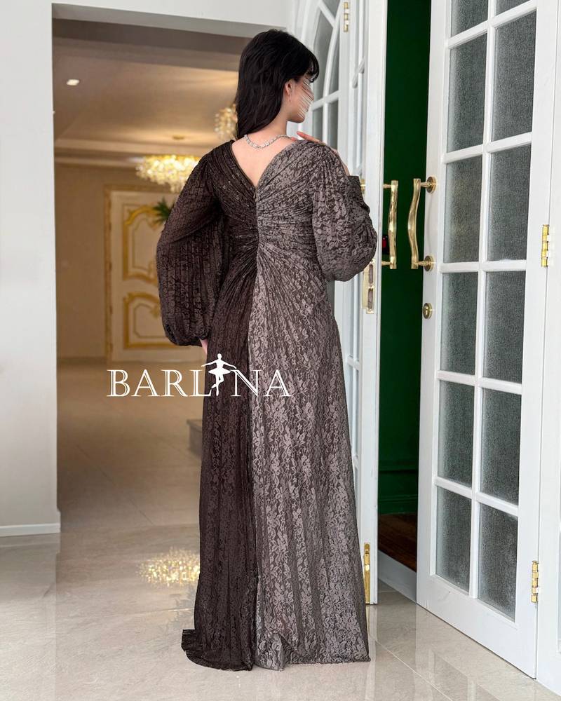 Luxurious brown dress with a draped wrap design