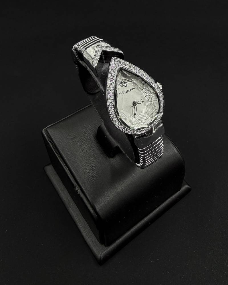 A luxurious women's watch in the shape of a teardrop