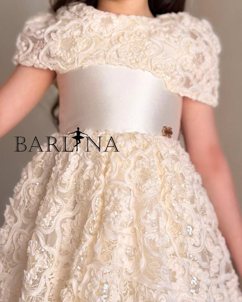 Off-white girls' dress with lace details