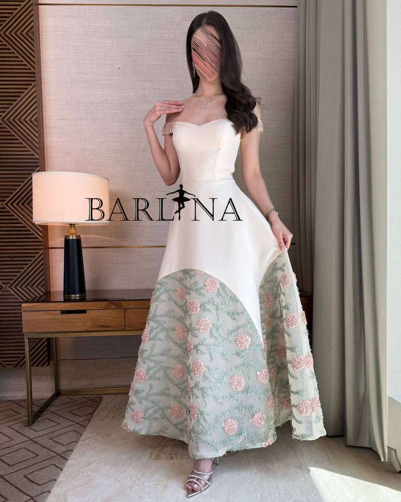 Beige dress with floral embroidered bottom