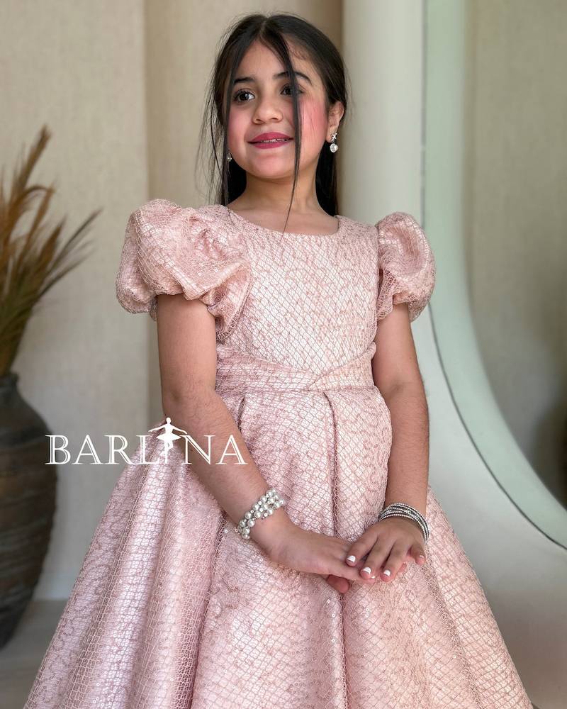 Pink fluffy girl's dress with puff sleeves