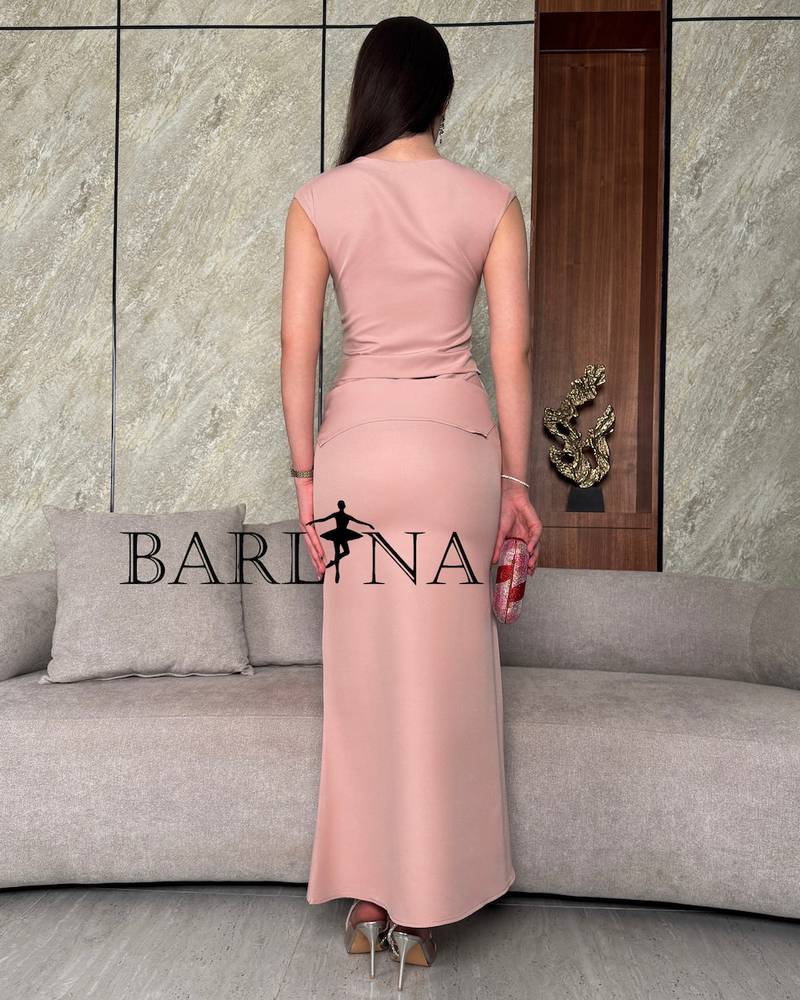 Pink two-piece dress with geometric pleats