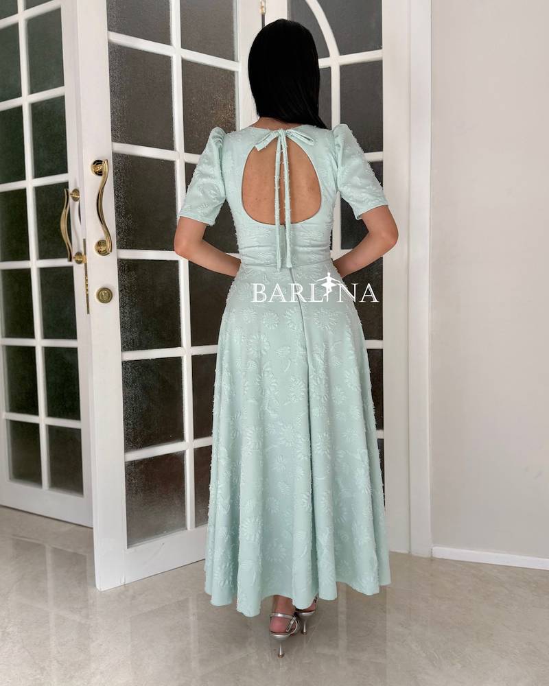 Soft Tiffany dress with a round back opening