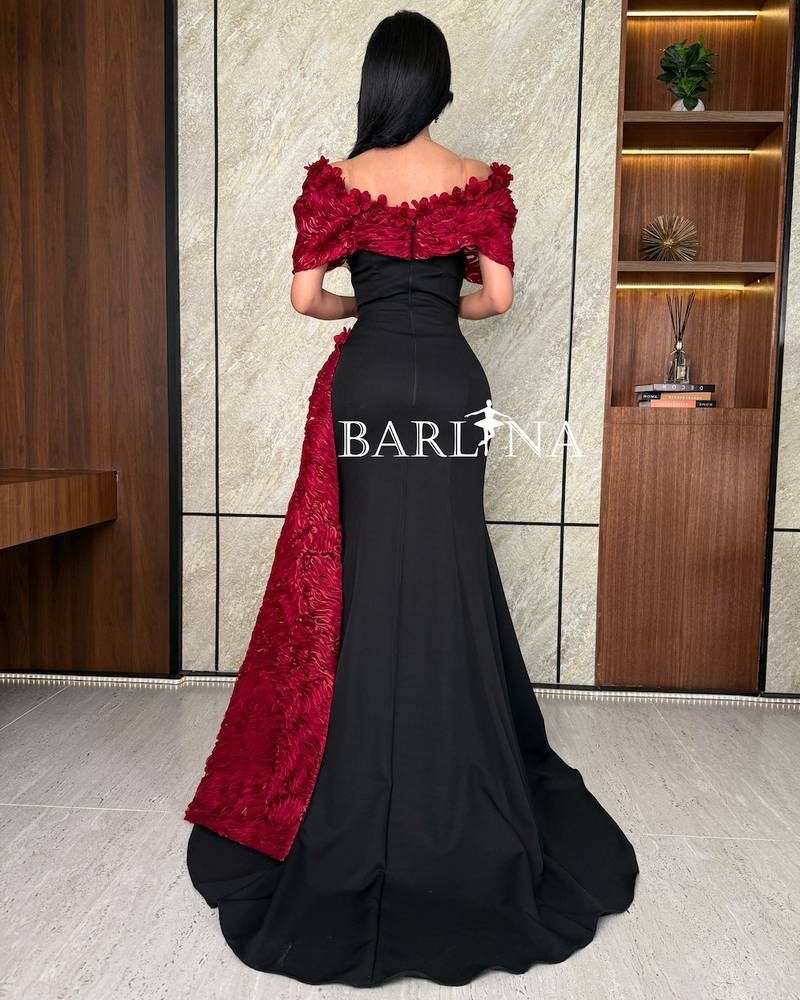 Black dress with red rose detailing
