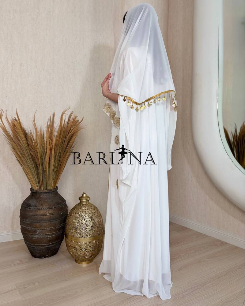 Luxurious jalabiya with gold embroidery and a shawl