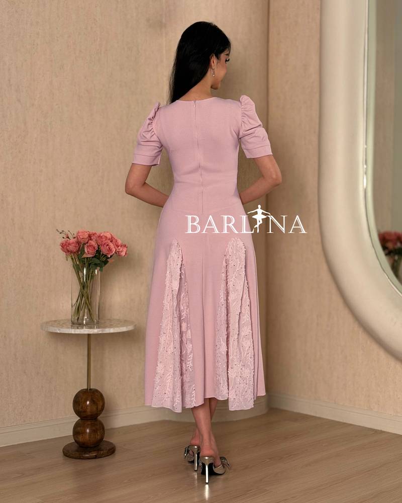 Pink midi dress with a soft  feminine cut