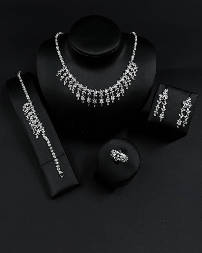 Elegant accessory set with dangling, studded details
