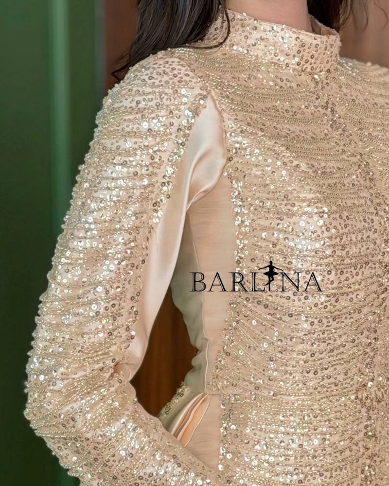 Cream gold-beaded dress with a back train