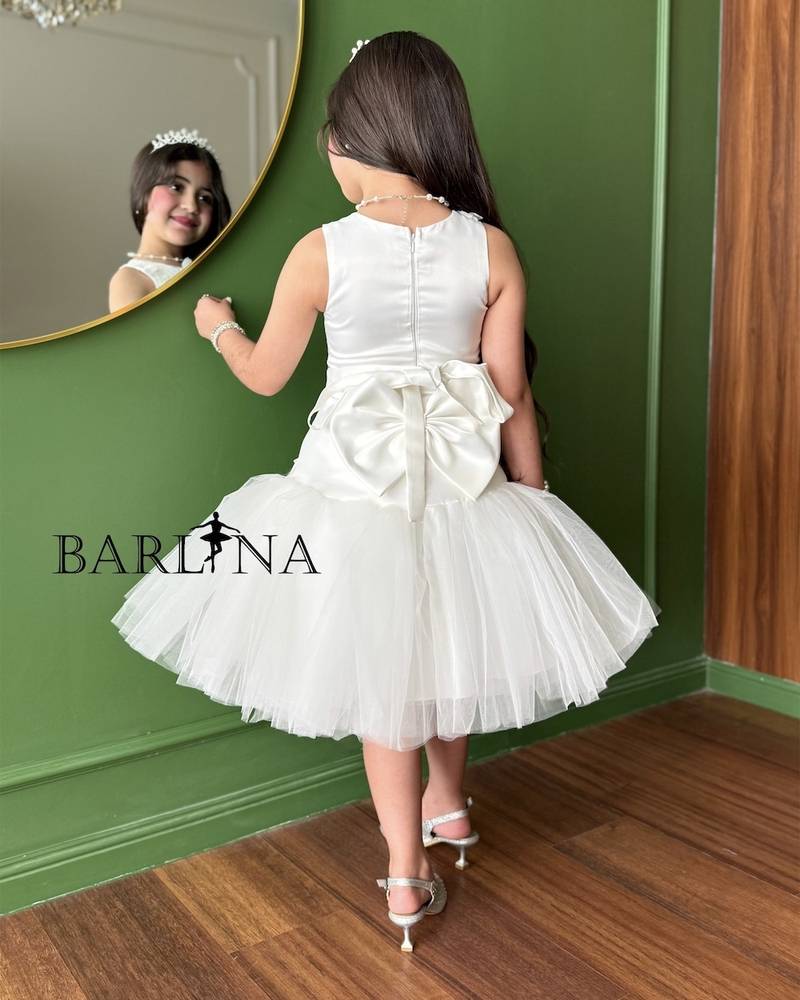 White girl's dress with elegant embroidery