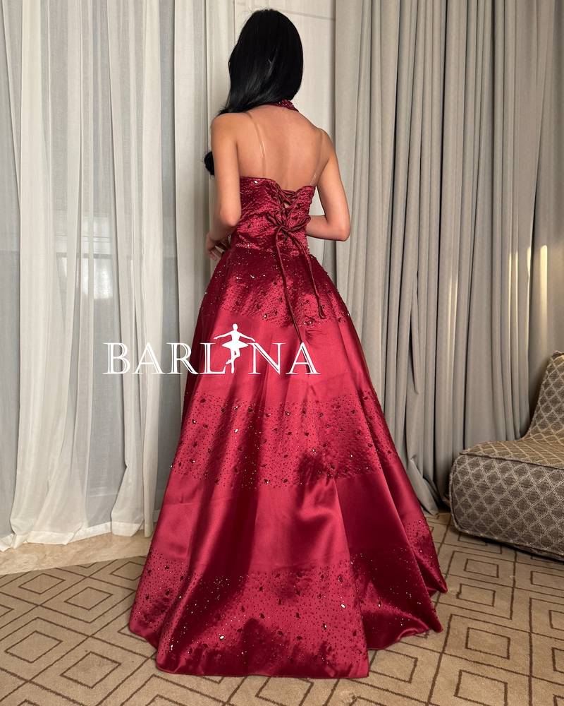 Burgundy evening dress with sequins and halter neck