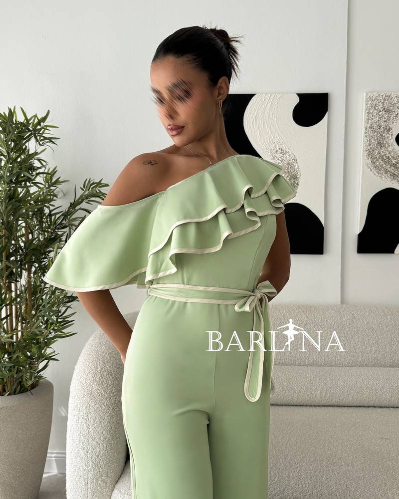 Apple jumpsuit with shoulder ruffles