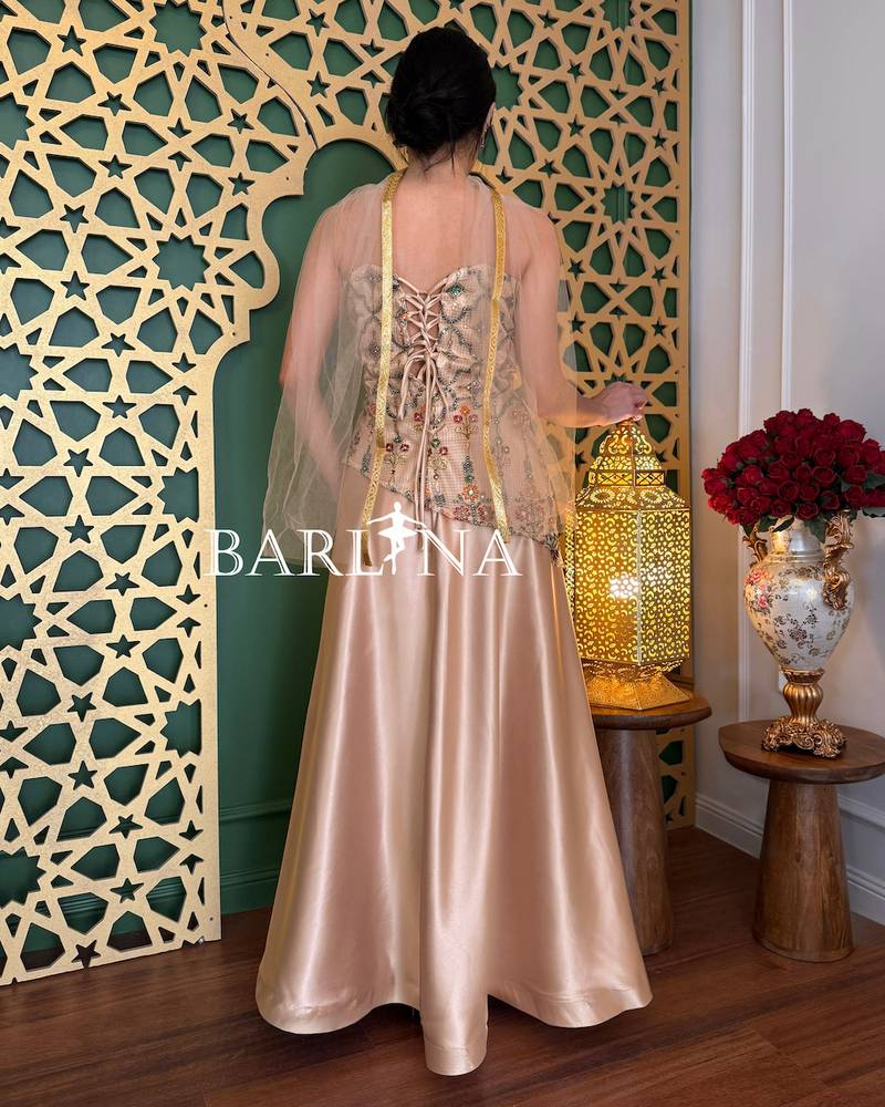 Gold evening dress with luxurious oriental embroidery