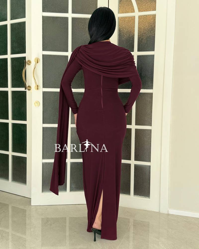 A soft burgundy dress with a wrap-around drape on the chest