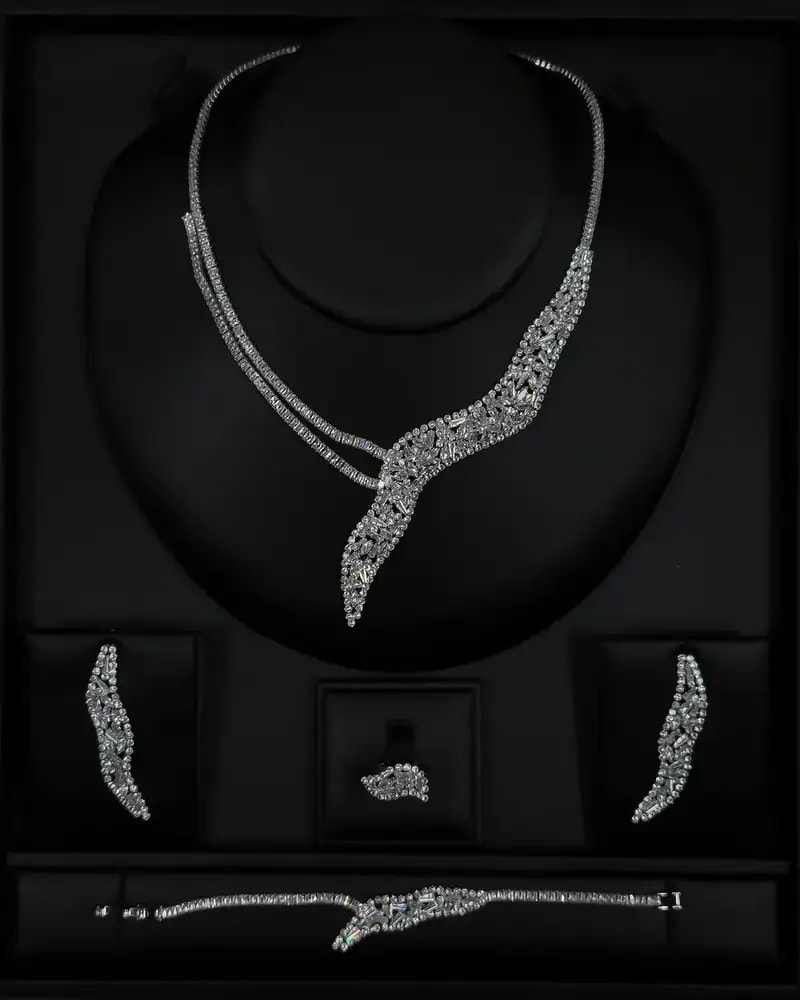 An accessory set with a streamlined asymmetrical design.