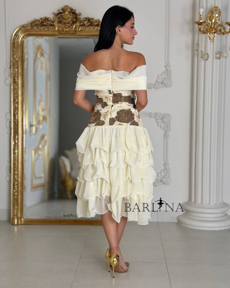 Off white midi dress with an off the shoulder design