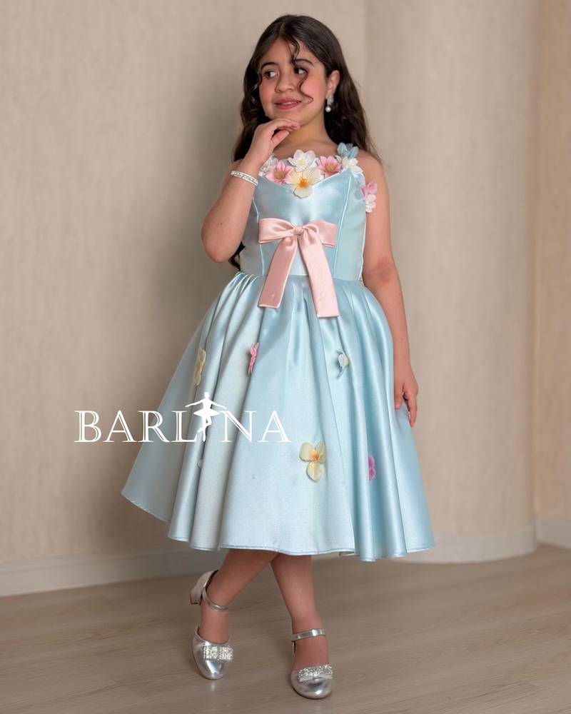 Sky blue girl's dress decorated with colorful roses