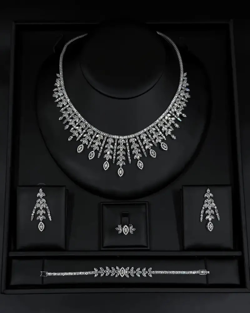 Crystal-studded accessory set with a dangling design