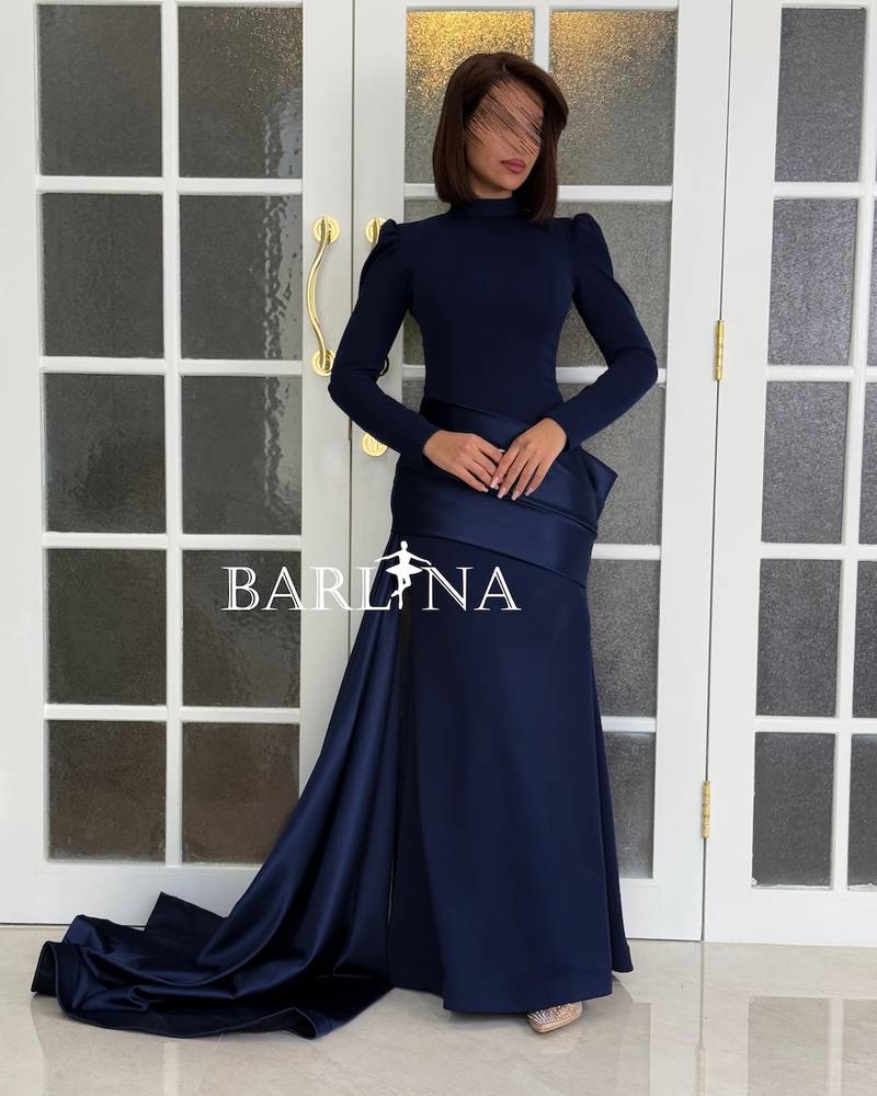 Navy blue dress with a royal cut and a side train