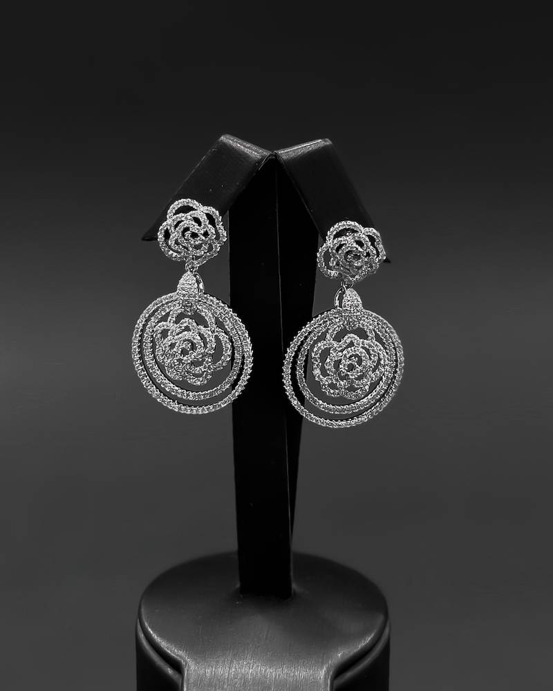 Hoop earrings with an interlocking rose design