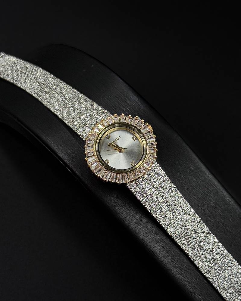Women's watch with an elegant round case and wide strap