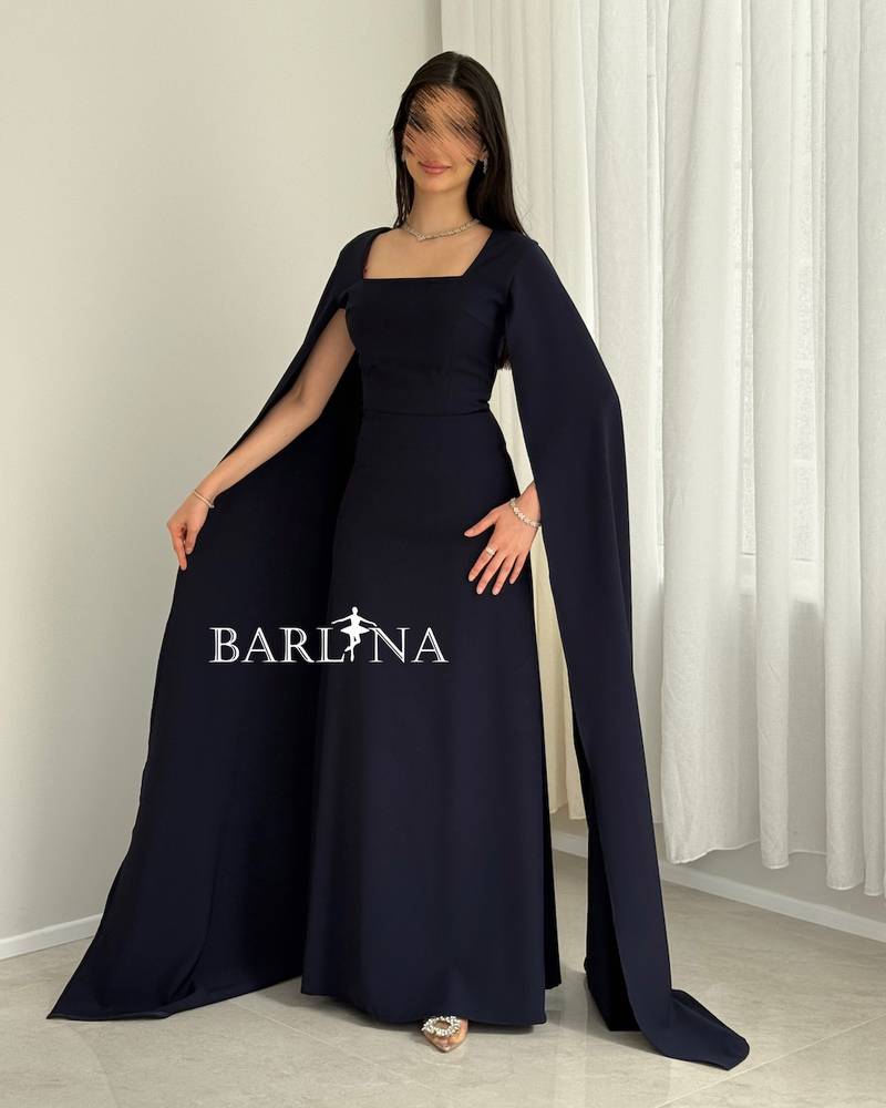 Long navy dress with flowing cape sleeves