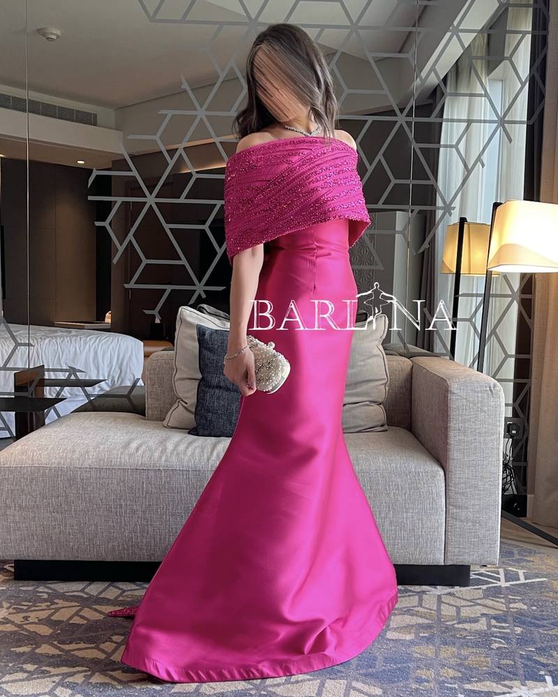 Fuchsia dress with a bow tail