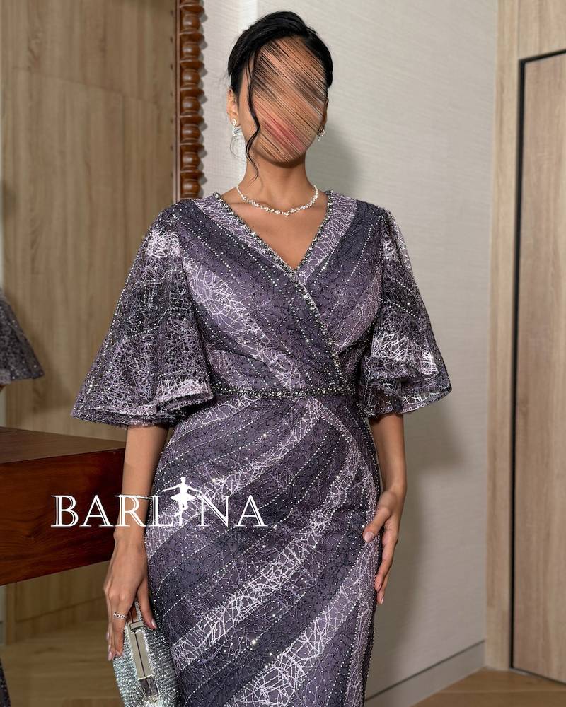 Purple dress with a wrap-around design