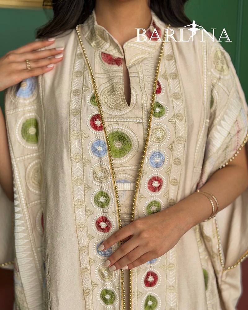 Beige jalabiya with colorful circular embroidery