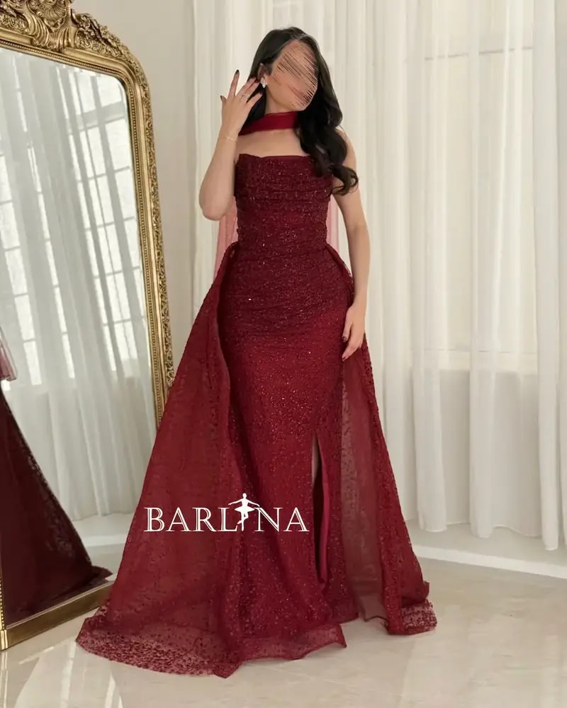 Burgundy embroidered evening dress with an elegant shawl