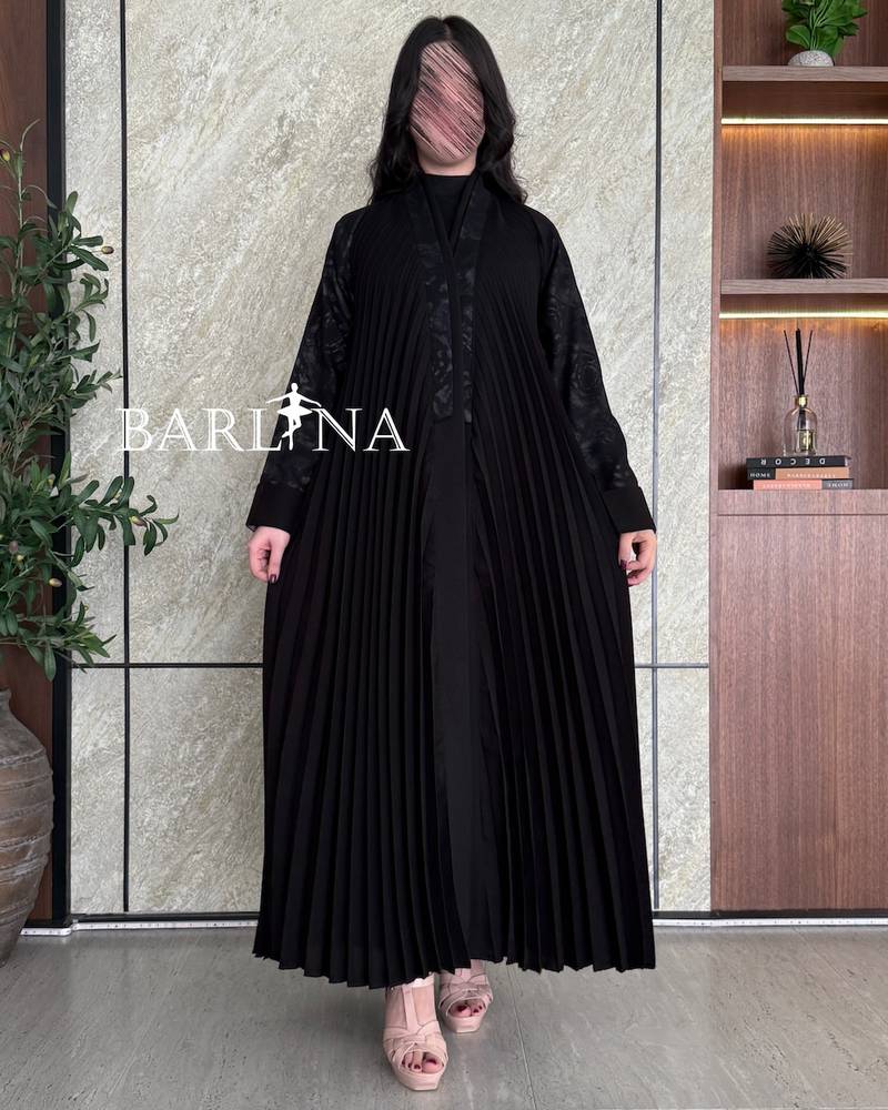 Luxurious black abaya with soft pleats throughout