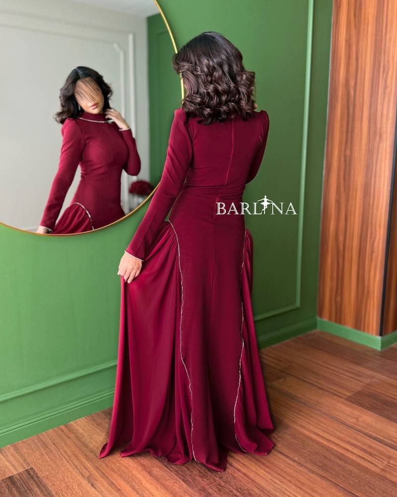 A royal burgundy dress with elegant side details