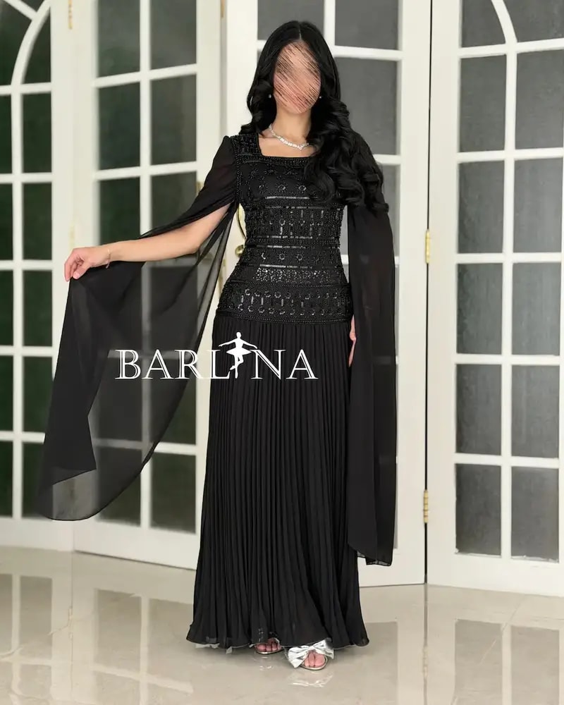 Dress with shimmering embroidery on the bodice