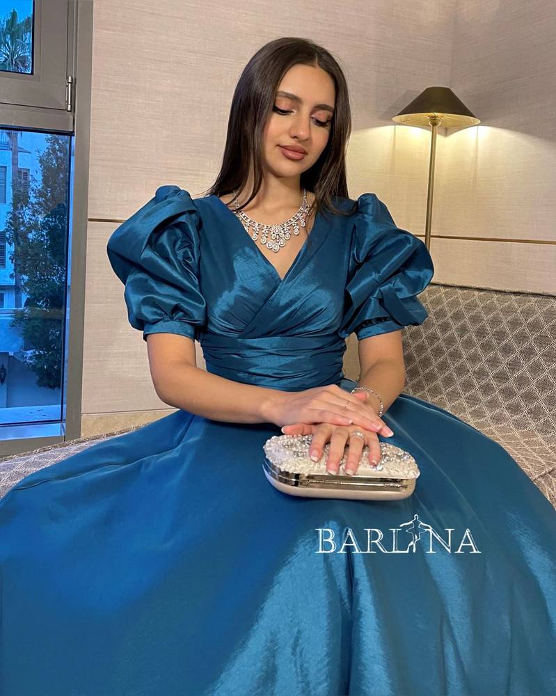 Blue midi dress with puff sleeves